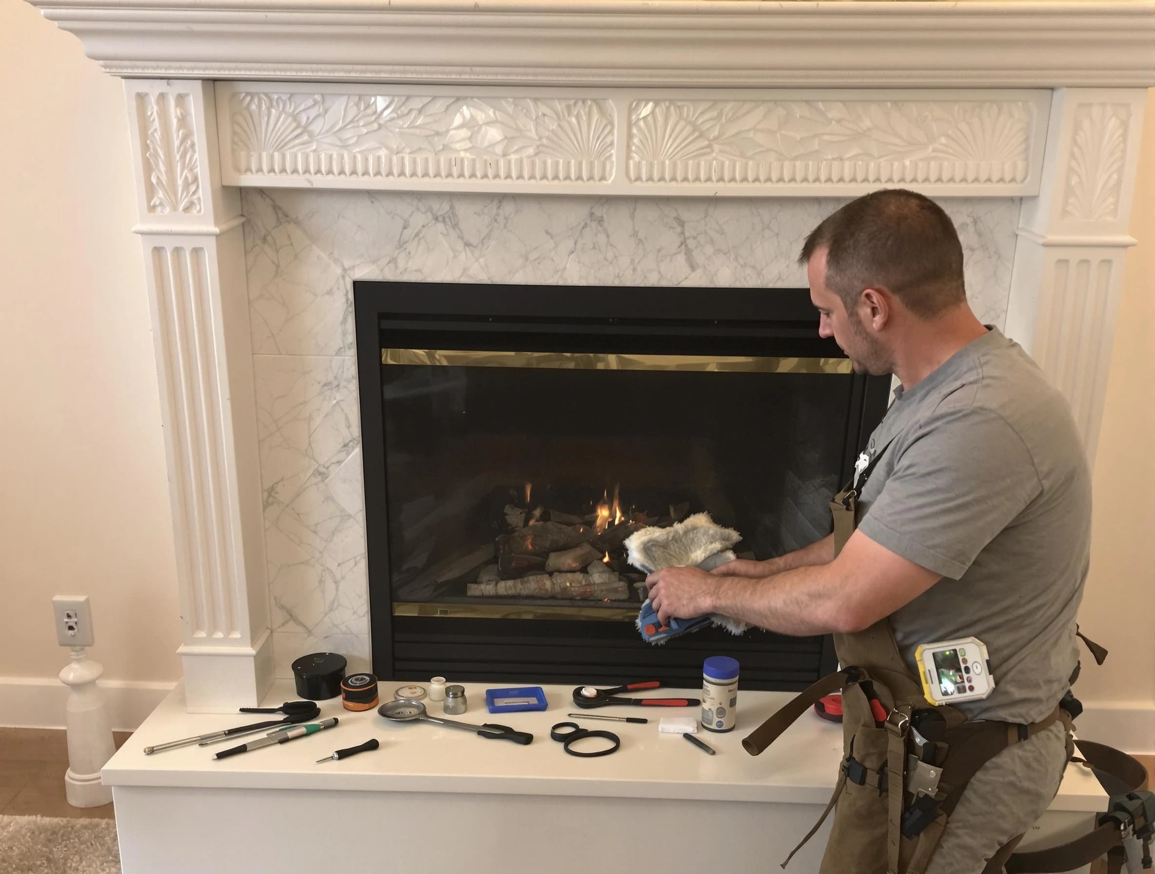 Brighton Chimney Sweep performing fireplace maintenance in Brighton, CO