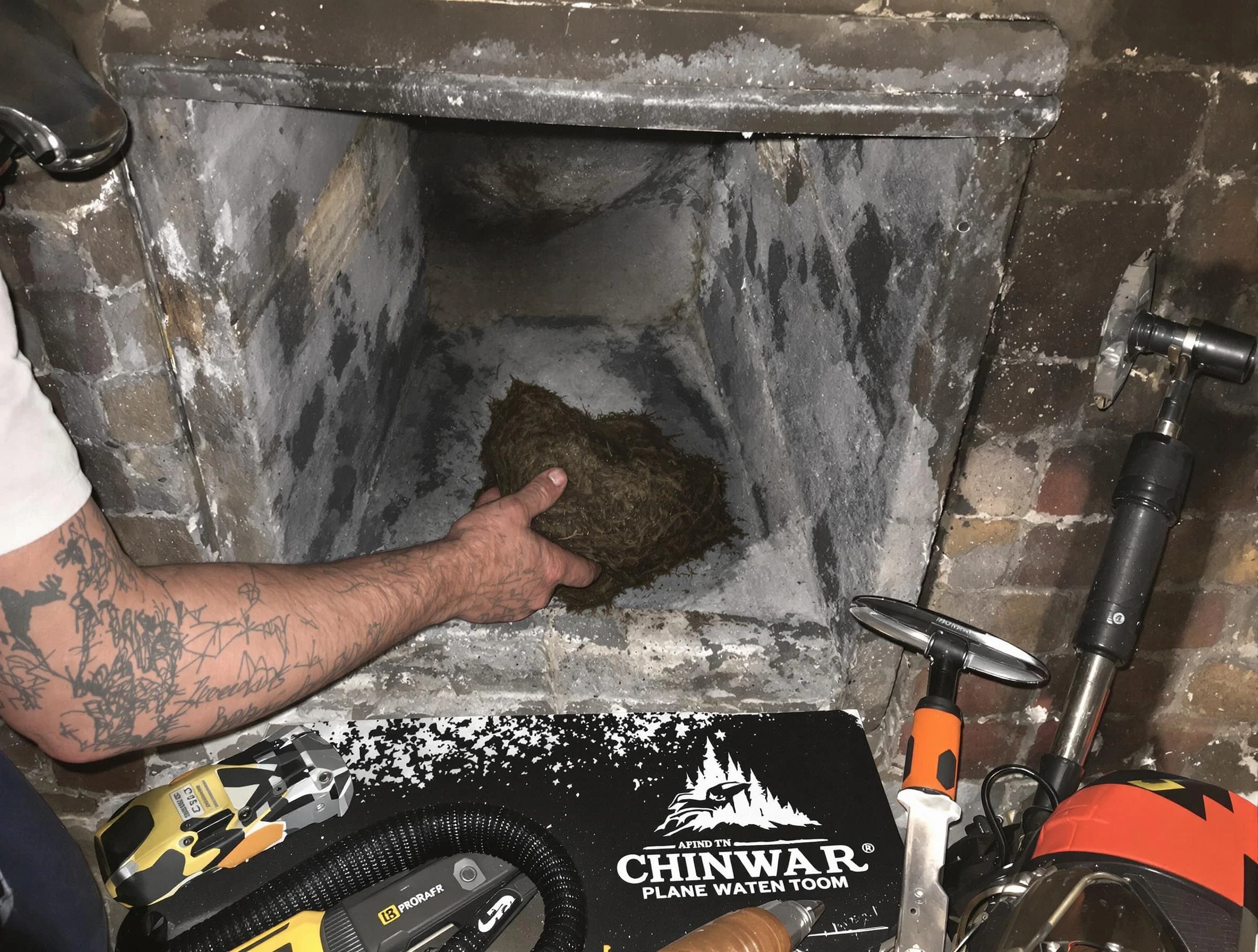 Brighton Chimney Sweep safely removing debris and screening chimney in Brighton, CO